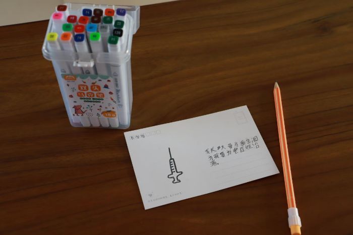 繪制夢想明信片;黃清攝